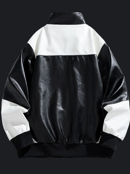 Back view of the URBAN UNIT Apex Track Jacket showing the high-contrast white shoulder panel and black leather-style body, engineered for durability and freedom.
