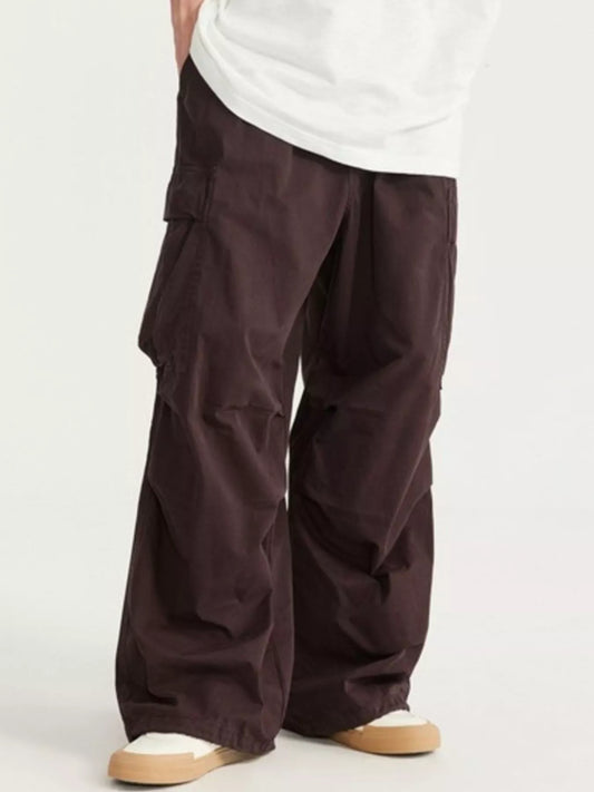 URBAN UNIT // Architect Kinetic Cargo in Earth Umber - Wide-leg silhouette showcase on model, engineered for freedom of movement and a bold street aesthetic.