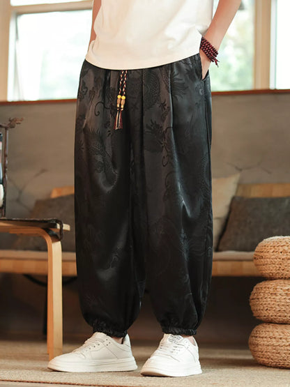 URBAN UNIT Dynasty Silhouette Jacquard Harem Pants in Midnight Black. Deep, authoritative streetwear foundation with subtle tonal dragon jacquard detailing.