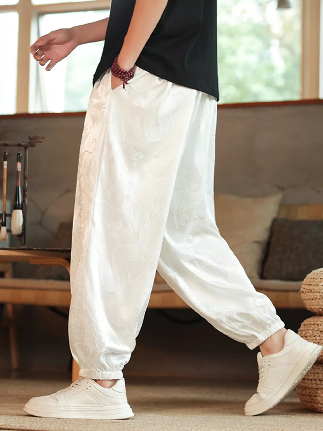 URBAN UNIT Dynasty Silhouette Jacquard Harem Pants in Phantom White. Relaxed wide-leg cut engineered for freedom of movement and clean street aesthetics.