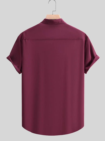 Back view of the URBAN UNIT Foundation Short Sleeve Shirt in Oxblood Red. Demonstrating the structured, oversized fit and crisp silhouette essential for modern streetwear aesthetics.