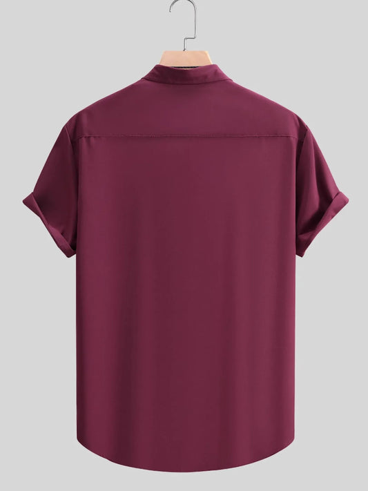 Back view of the URBAN UNIT Foundation Short Sleeve Shirt in Oxblood Red. Demonstrating the structured, oversized fit and crisp silhouette essential for modern streetwear aesthetics.