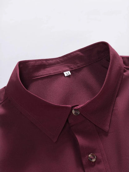 Detailed view of the sharp collar on the URBAN UNIT Foundation Short Sleeve Shirt in Oxblood Red. Showcasing the tailored edge that bridges professional discipline with raw street style.
