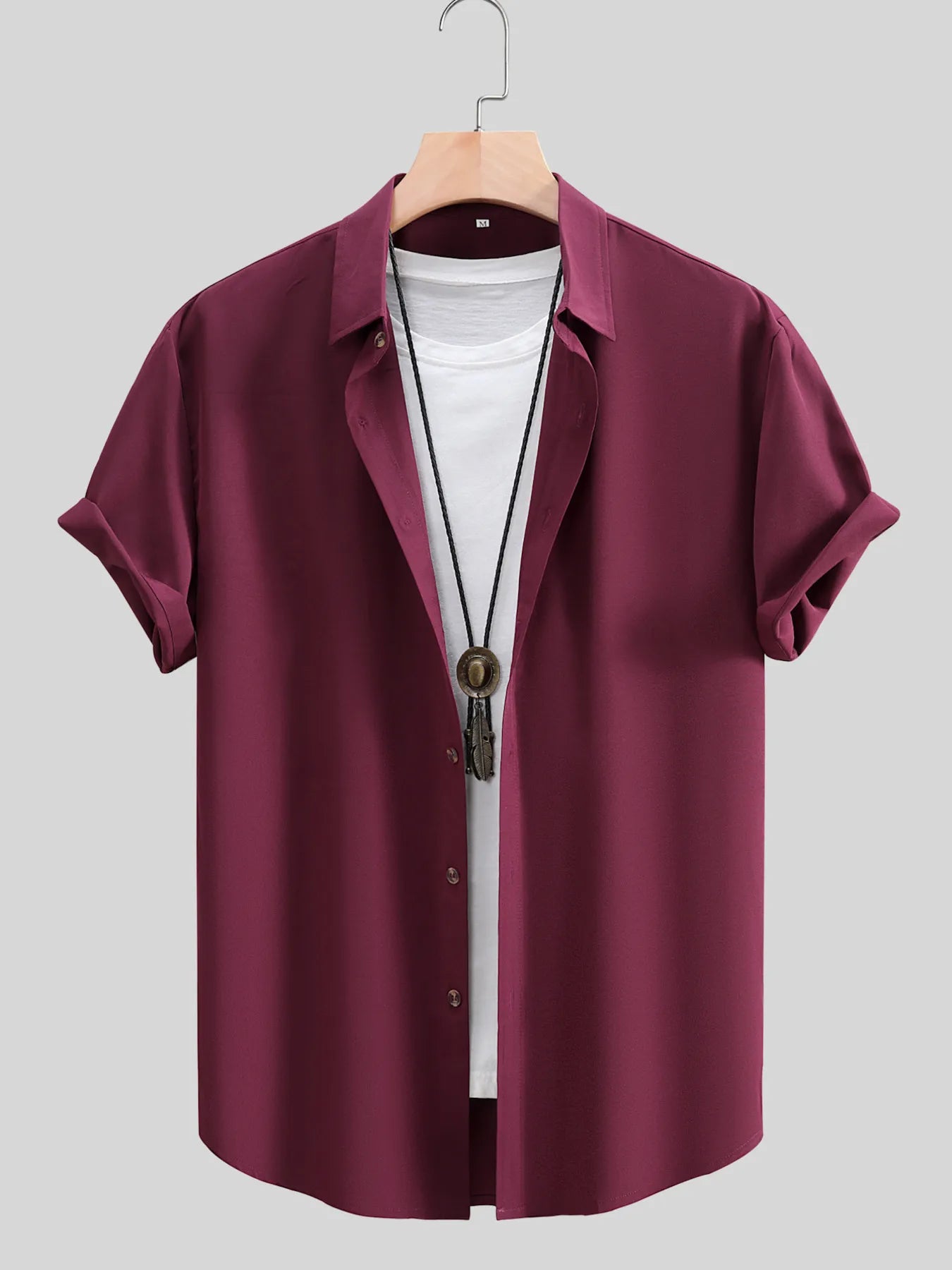URBAN UNIT The Foundation Short Sleeve Shirt in Oxblood Red. Front view showcasing the relaxed, plus-size optimized drape and sharp collar, styled open for the urban grind.