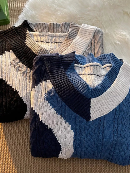 Stacked URBAN UNIT Fracture V-Neck Knit Sweaters showing the Midnight Black and Deep Water Blue colorways. Bold, Plus Size Optimized streetwear knitwear for maximum mobility.