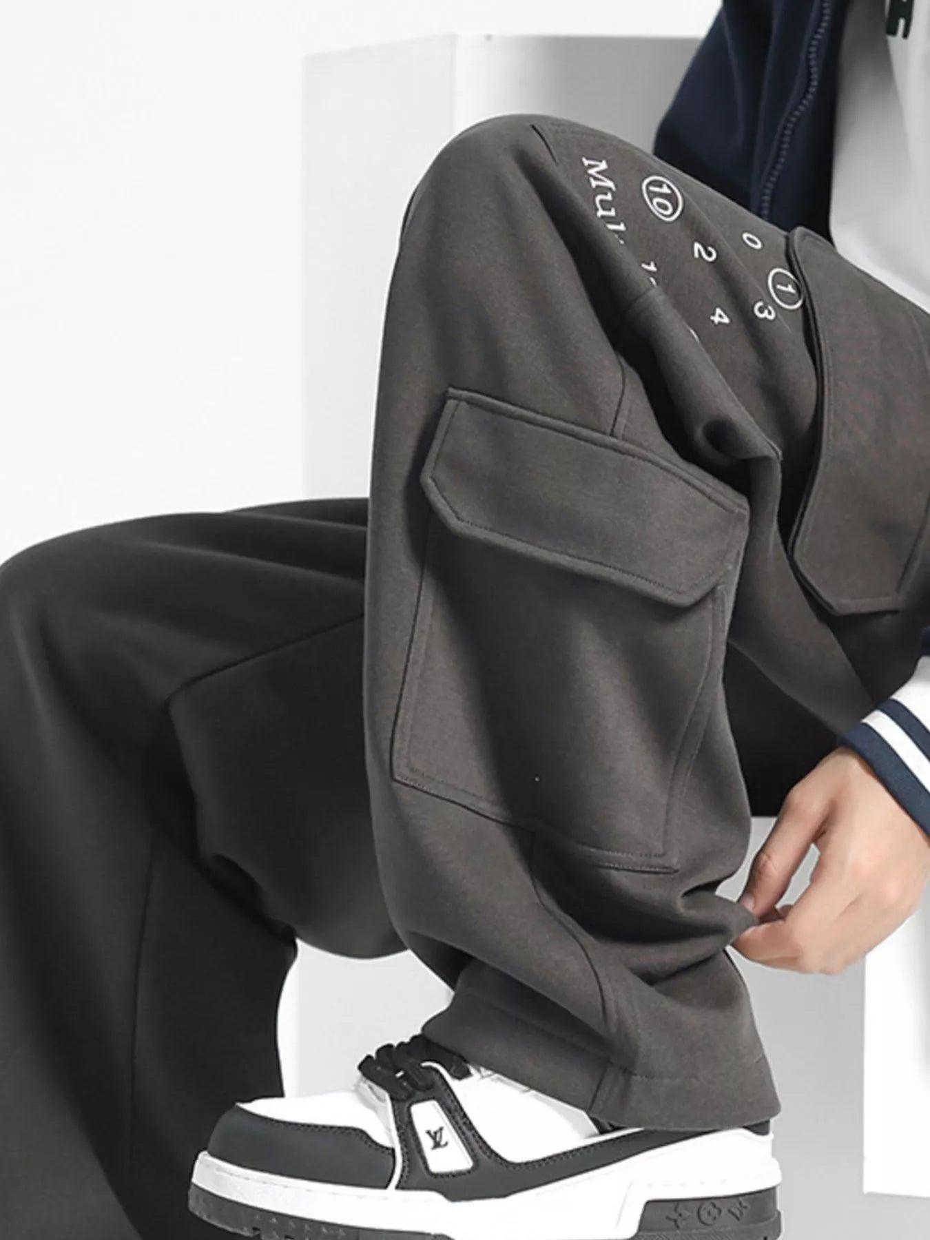 URBAN UNIT Multiple Star Loose Fit Cargo Pants in Asphalt Grey - Pocket and Graphic Detail