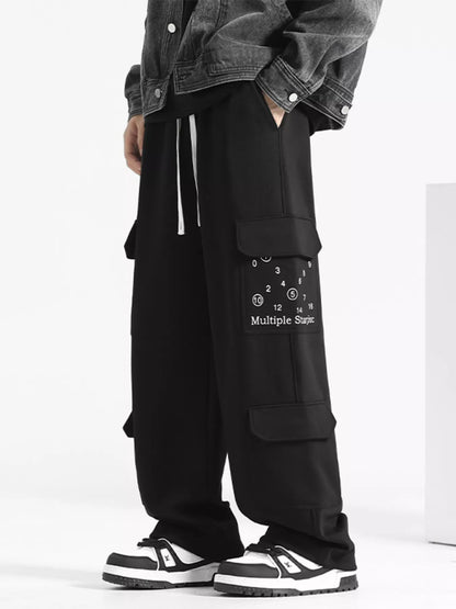 URBAN UNIT Multiple Star Loose Fit Cargo Pants in Midnight Black - Full Side View