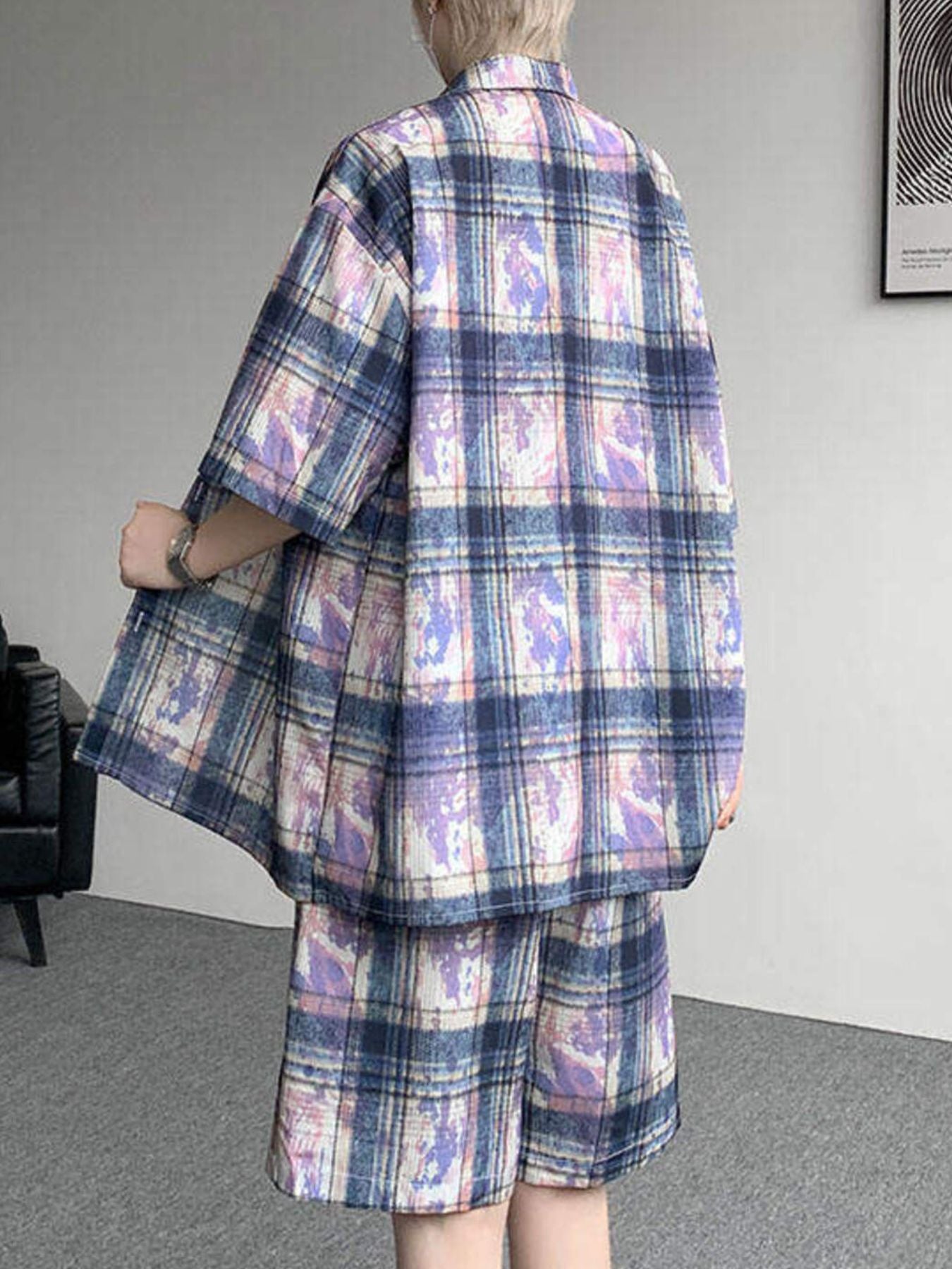 Back view of the URBAN UNIT OFF-GRID Plaid Set in Cobalt Phantom, highlighting the relaxed drop-shoulder design and distorted plaid print.