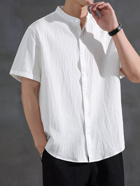 Close-up of the URBAN UNIT Origin Silhouette Mandarin Collar Shirt in Pure White, highlighting the clean minimalist collar design and breathable textured fabric.