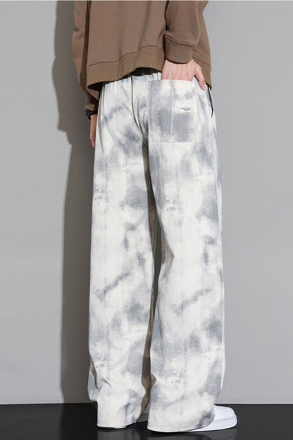 Back view of the URBAN UNIT Static Wash Pant in Concrete Static, featuring the back pocket design and continuous loose-fit silhouette.