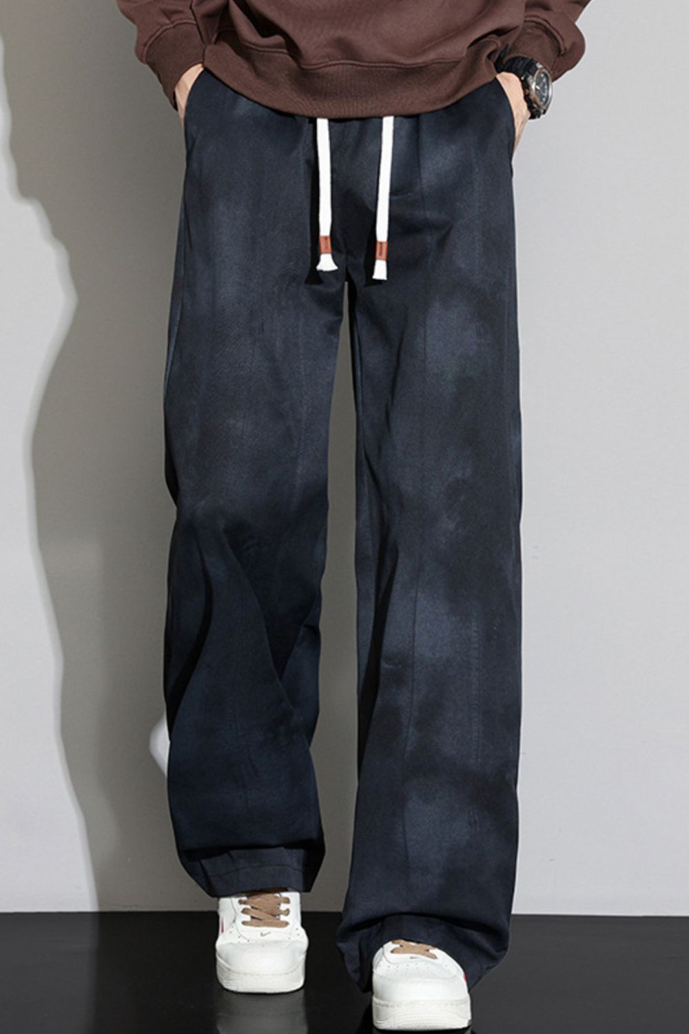 Front view of the URBAN UNIT Static Wash Tie-Dye Pant in Phantom Wash, showing the dark, disruptive tone and heavy-duty contrast drawstrings.