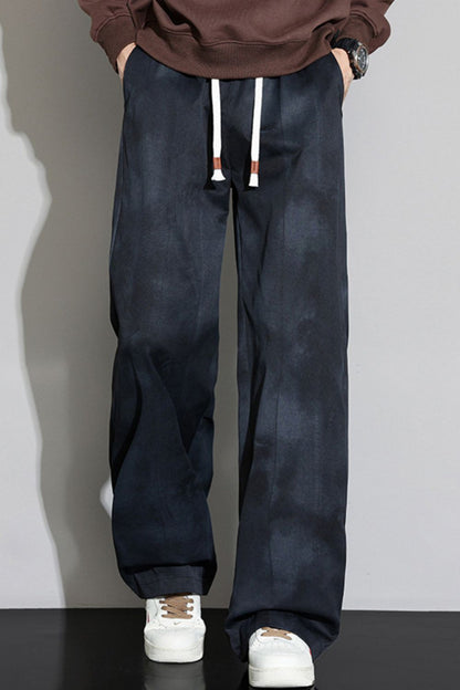 Front view of the URBAN UNIT Static Wash Tie-Dye Pant in Phantom Wash, showing the dark, disruptive tone and heavy-duty contrast drawstrings.