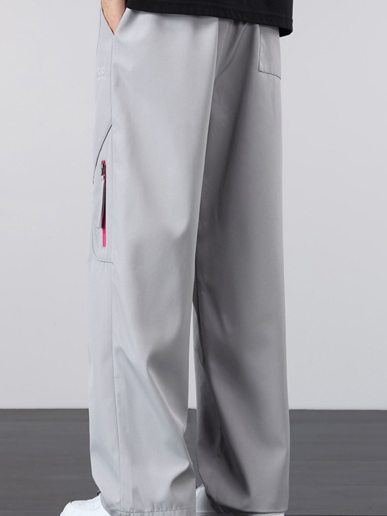 Close-up of the reinforced side pocket on the UU Vector Zip Loose-Fit Cargo Pants in Concrete Grey by URBAN UNIT.