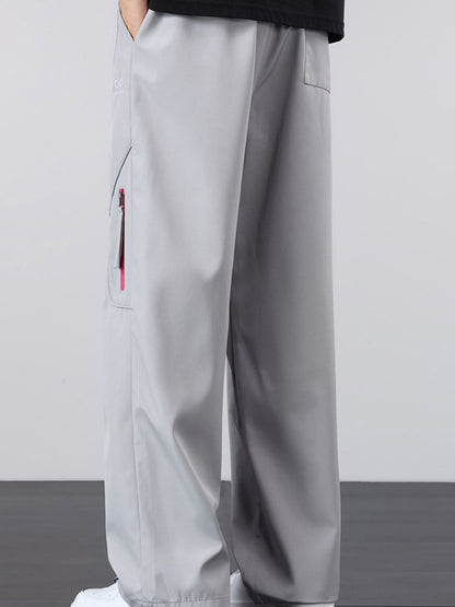 Close-up of the reinforced side pocket on the UU Vector Zip Loose-Fit Cargo Pants in Concrete Grey by URBAN UNIT.