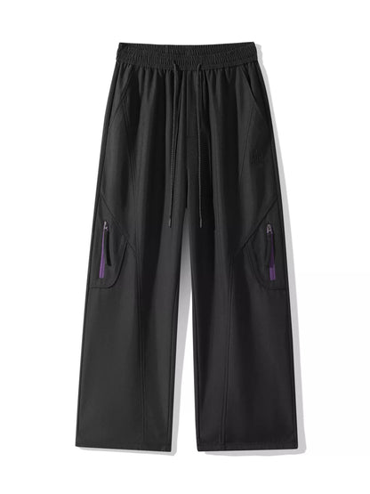 Front view of the UU Vector Zip Loose-Fit Cargo Pants in Midnight Black. Built for the daily grind by URBAN UNIT.