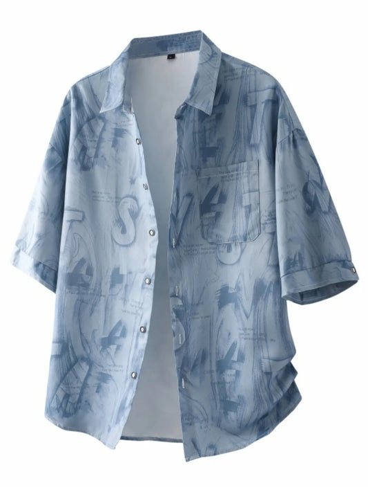 Glitch Blue Front: Front view of the URBAN UNIT Cipher Print Oversized Shirt in Glitch Blue, featuring a high-contrast abstract urban graphic and button-down design.