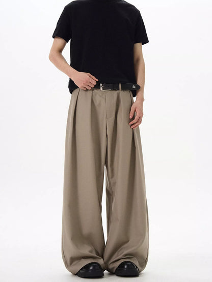 Close up of front pleat and pocket details on URBAN UNIT wide-leg pants in Tactical Khaki