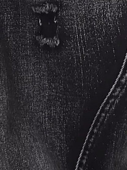 Close-up of heavy distressed detailing, frayed edges, and rigid 100% cotton texture on URBAN UNIT streetwear denim.