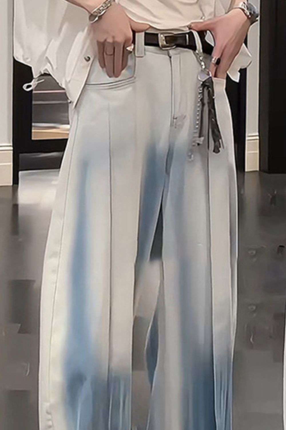 Model wearing URBAN UNIT Gradient Wash Wide-Leg Denim showing the bleached front fade effect and oversized fit.