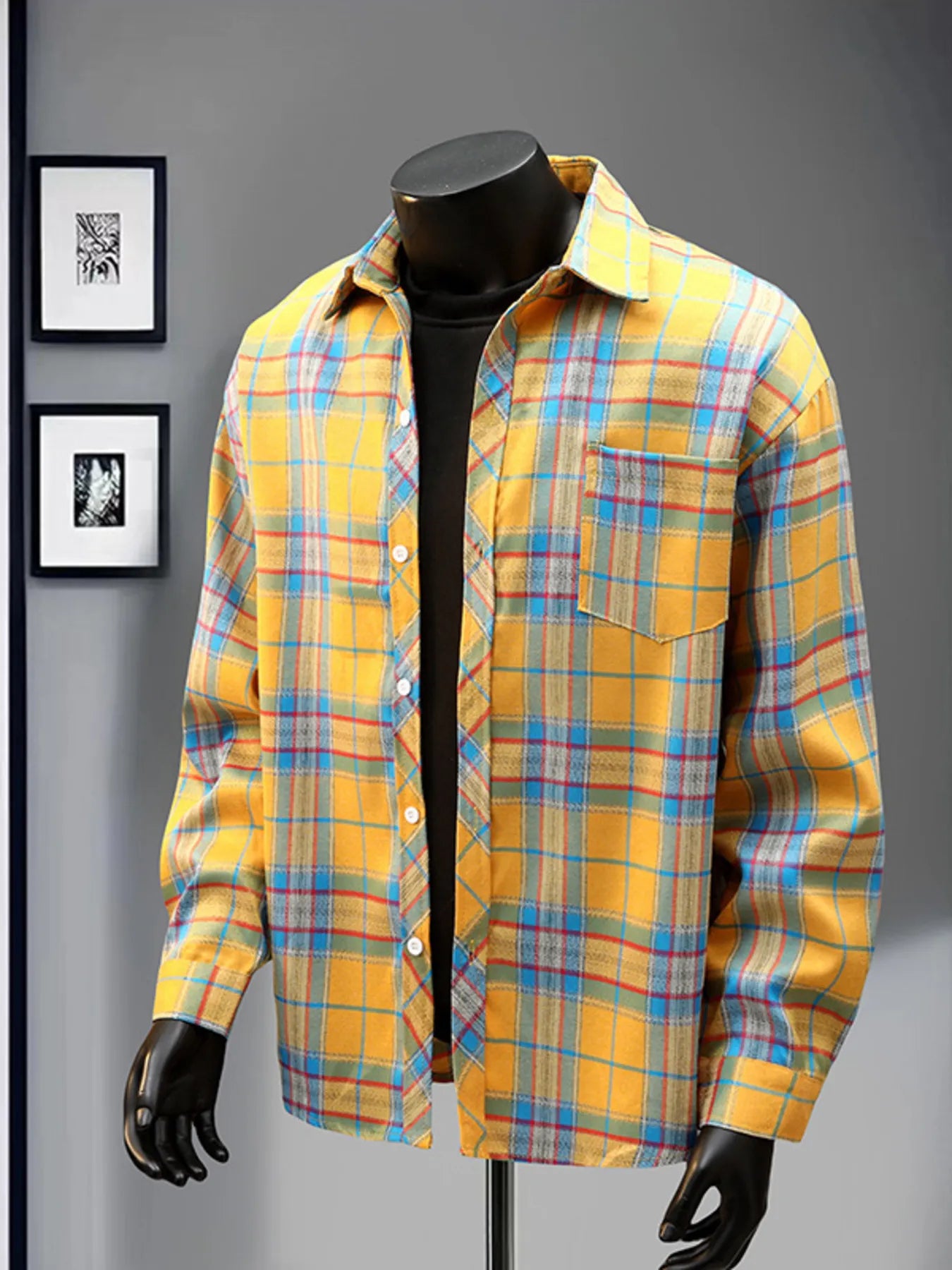 Front view of the URBAN UNIT Gridlock Overshirt styled over a black layer, featuring the reinforced chest pocket and open collar.