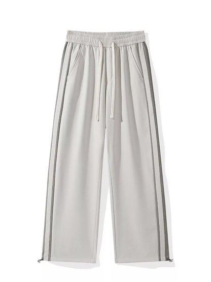 Studio flatlay of the Industrial Beige UU Parallel Silhouette Cargo with adjustable drawstring waist.
