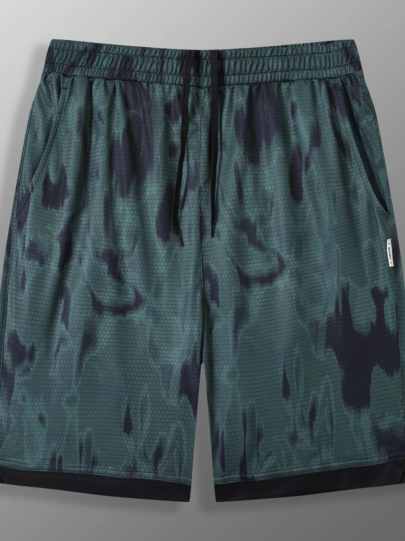 URBAN UNIT SHIFT Tie-Dye Active Shorts in Toxic Lime Shadow - Front view displaying the bold green and black street aesthetic.