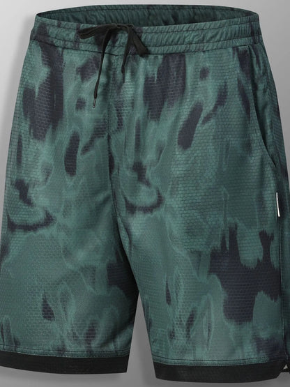 URBAN UNIT SHIFT Tie-Dye Active Shorts in Toxic Lime Shadow. Front view displaying the bold green and black distressed street aesthetic with a dark contrasting hem.