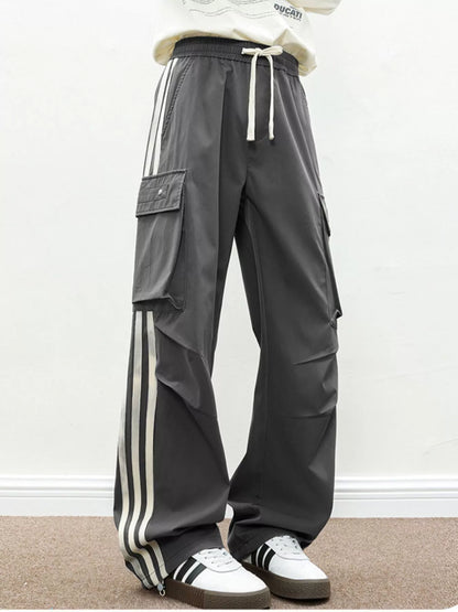 Back view of the UU Vanguard Cargo in Graphite Stealth highlighting the voluminous streetwear silhouette.